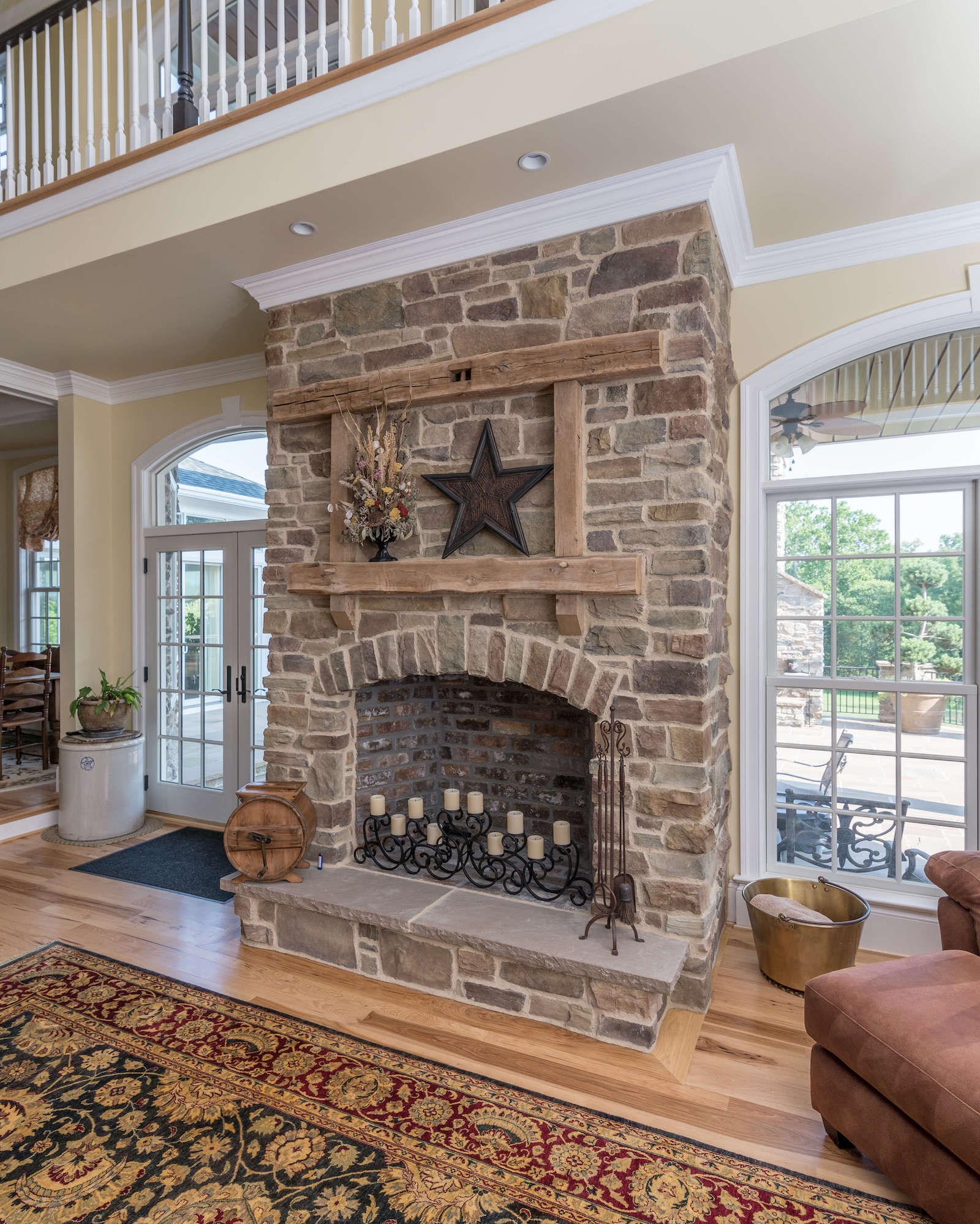 Eldorado Stone Cypress Ridge Orchard warm gray and brown thin stone on interior fireplace