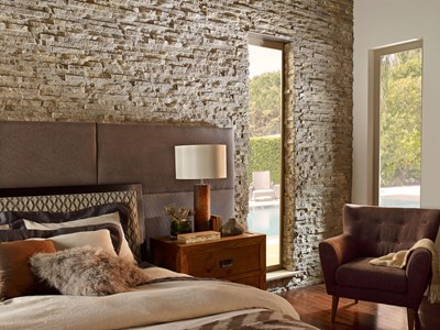 Eldorado Stone European Ledge Cottonwood gray to white thin stone interior wall in bedroom