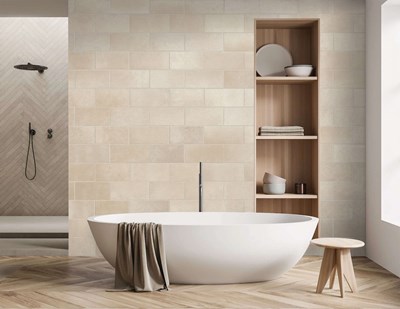 Cultured Stone Parchment Cast Fit warm cream white rectangular thin stone in bathroom with elegant soaking tub