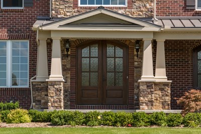 Glen-Gery | Glen Ridge Buckingham building stone veneer on front of home's main entrance showing a double front door