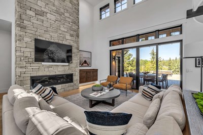 Cultured Stone Sculpted Ashlar Silver Shore warm gray thin stone on interior living room fireplace