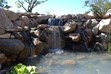 Granite Boulders and Cobbles - Small view of granite cobbles.