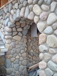 Fireboulder Indiana Granite Cobbles - Compact view of Indiana Granite cobbles.