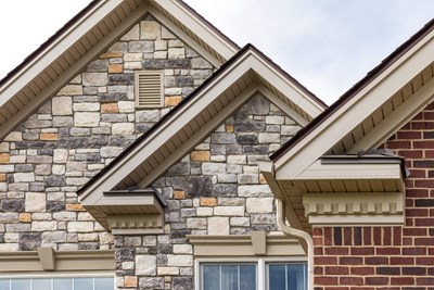 Glen-Gery | Limestone Chisel Grey building stone veneer on exterior of home