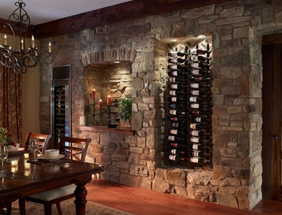 Eldorado Stone Cypress Ridge Orchard warm gray thin stone on interior wall with built in wine display