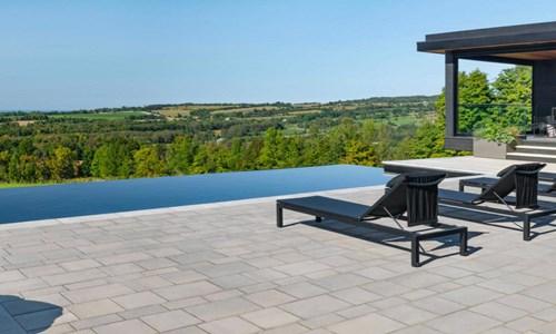 image of pool overlooking landscape of mountains 