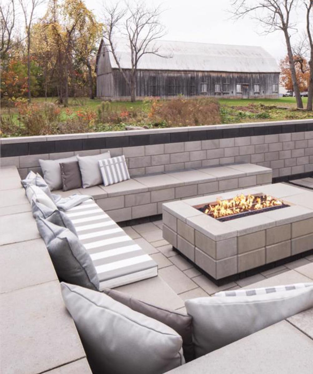 Techo-Bloc Patio Firepit Slabs - Cropped view of Techo-Bloc backyard slabs.
