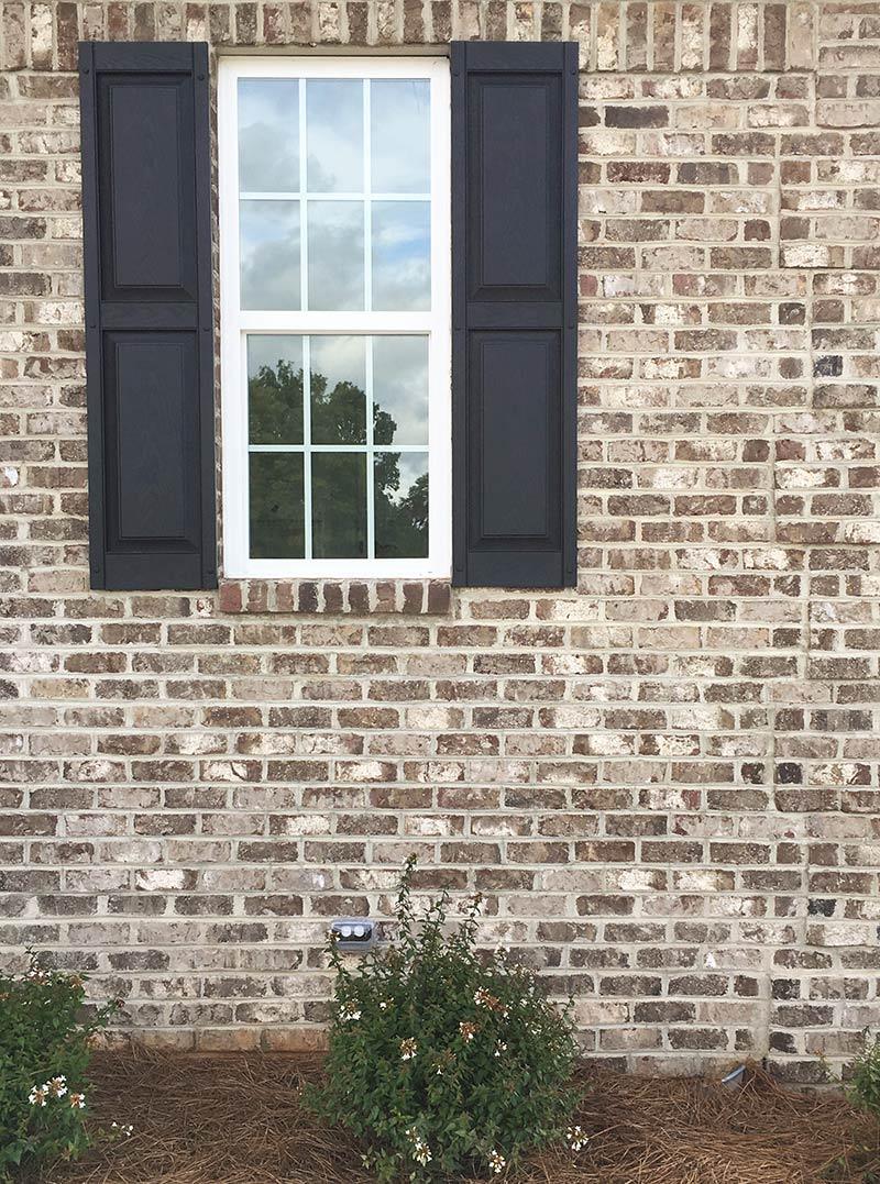 Barker House brown facebrick pine hall