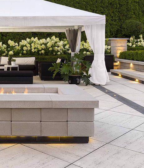 Techo-Bloc Backyard Patio with Travertina Raffinato Ivory